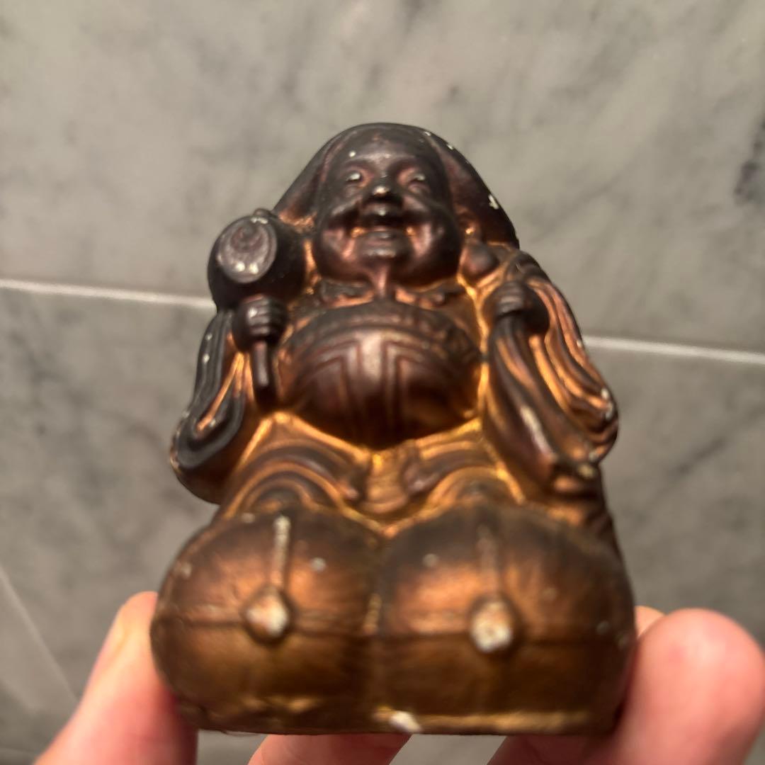 アンティーク明治時代平和的なお顔で 笑顔が素敵な大黒様の陶器オブジェ
