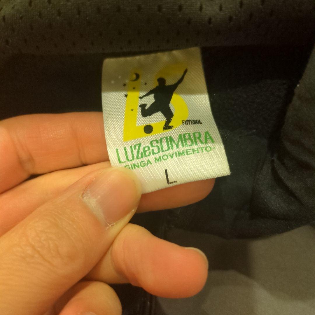 ルースイソンブラピステ・ウィンドブレーカー L 黒/グレー