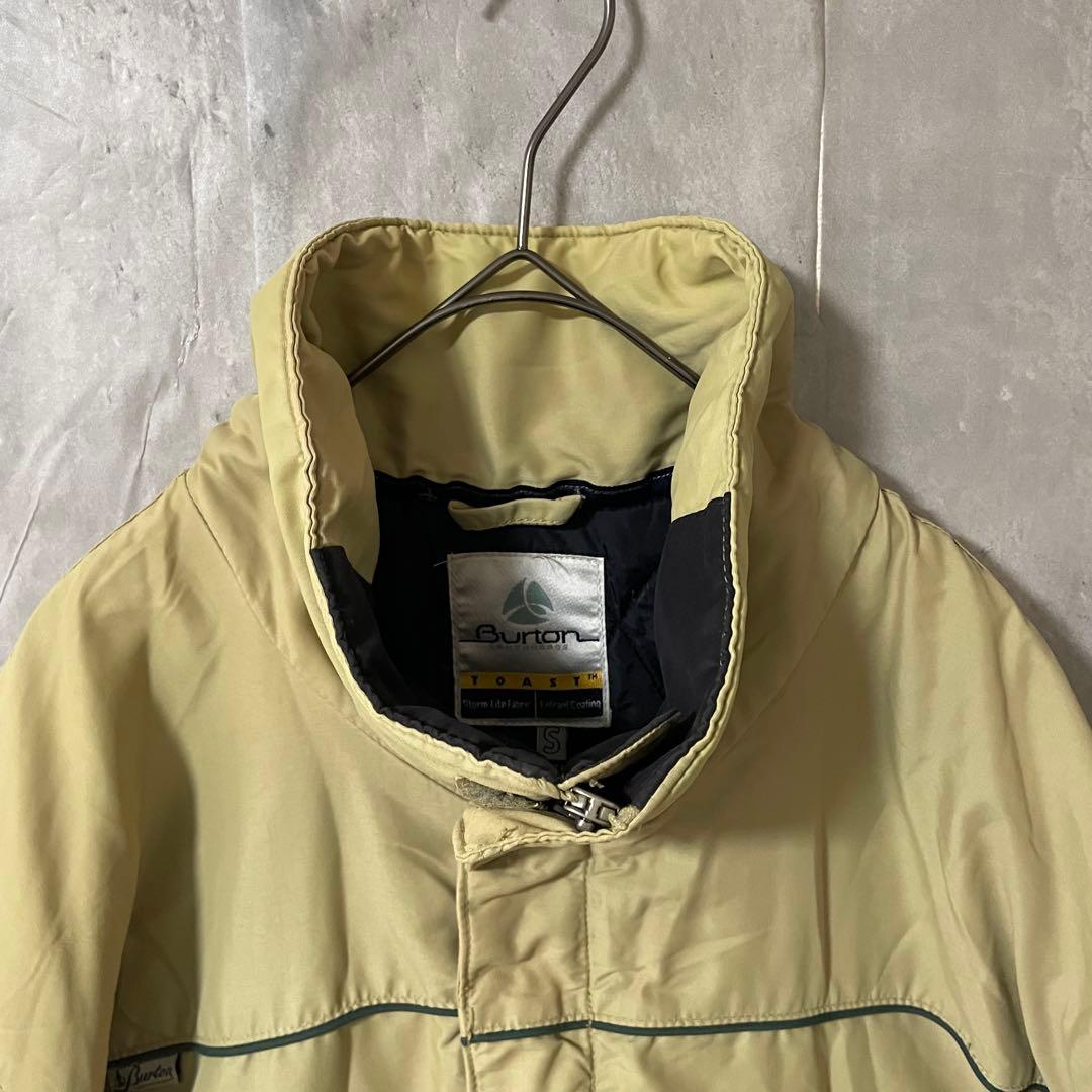 Burtonバートンスキーウェアスノーボードジャケットブルゾンベージュ刺繍ロゴ