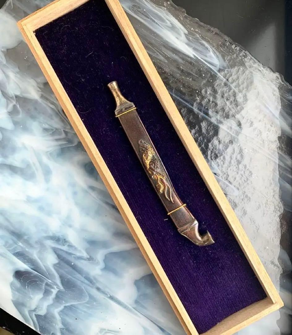 煙管　釣り人図彫刻