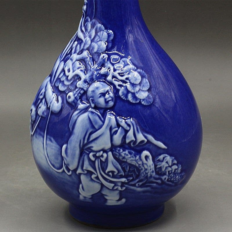 清乾隆 藍釉の浮彫り老子出関蒜頭瓶  景徳鎮 陶磁器 装飾品 工芸品美術品 置物
