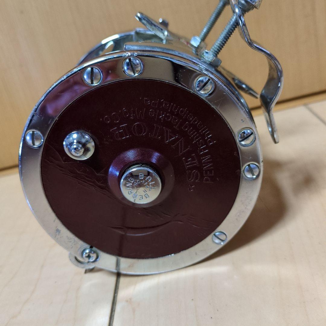 1000 THRUST 両軸リール シルバー/レッド