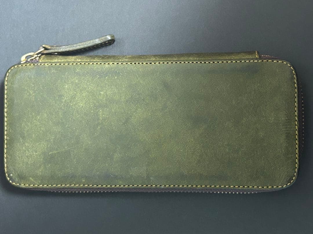 バハギア ラウンドジップペンケース プエブロオリーバ