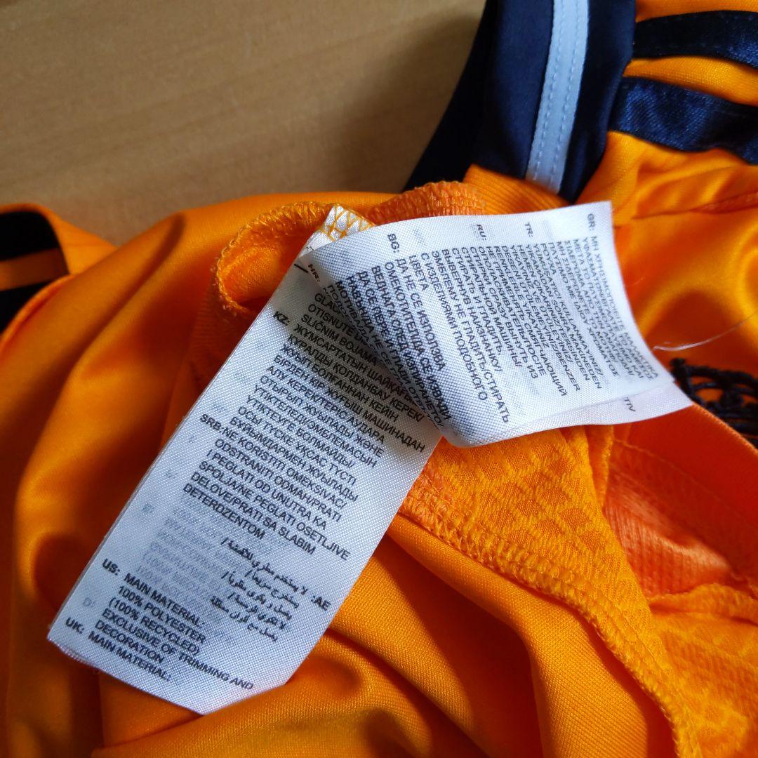 Real Madrid シャツ オレンジ 7-8Y