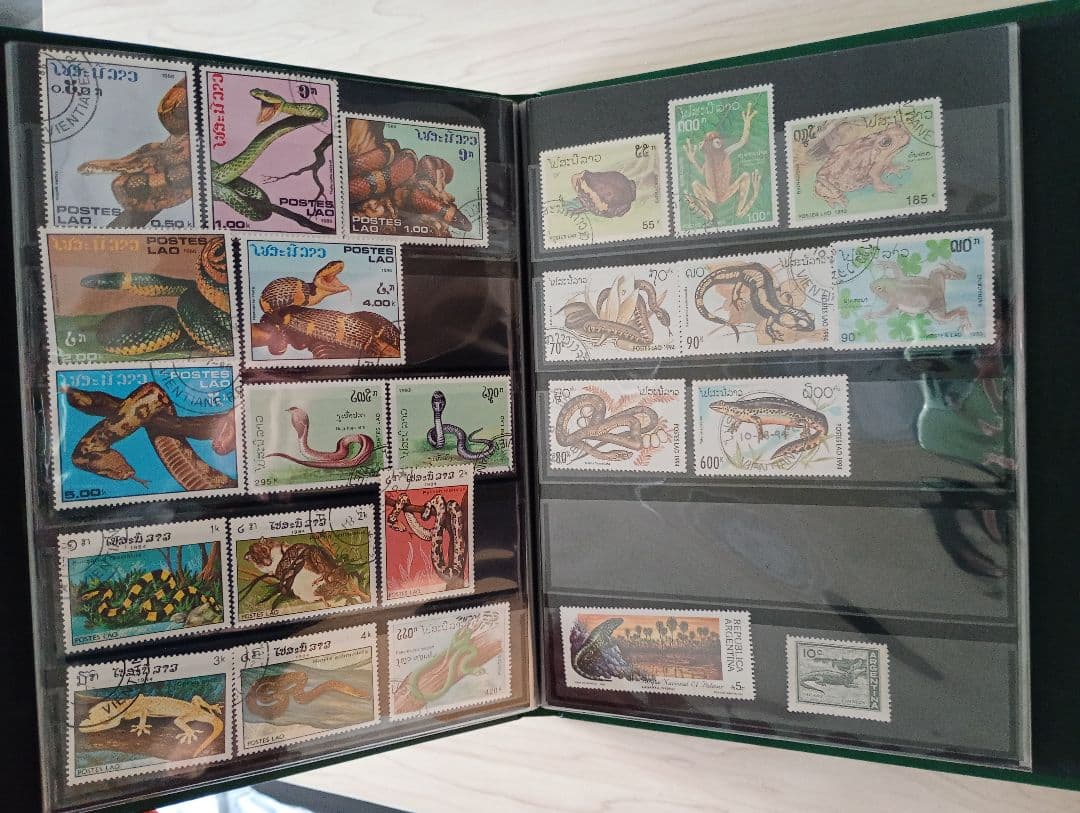 希少31まで限定出品！手彫竜銭ヘビ爬虫類トカゲ　テージー切手アルバムまとめ売り