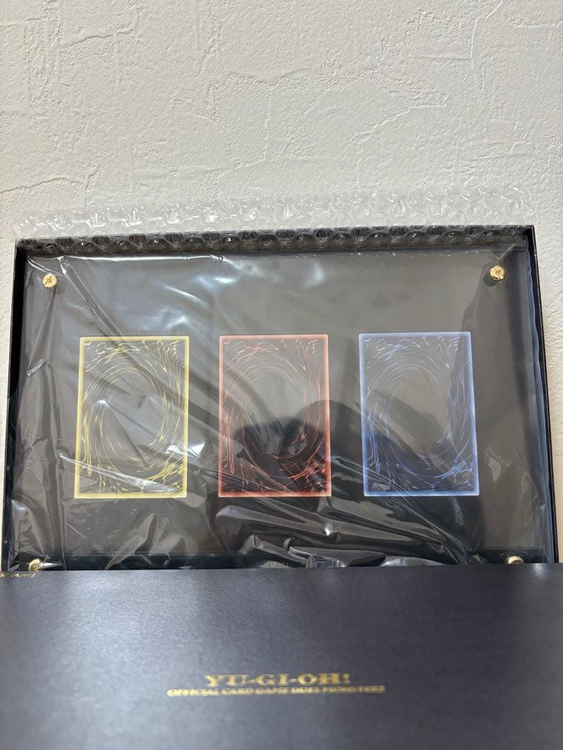 遊戯王カードゲーム25周年記念商品「三幻神」ステンレスカードセット