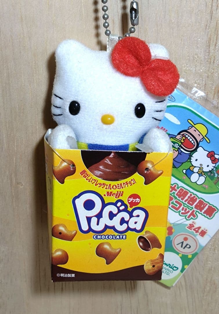 超激レア☆ハローキティ+明治製菓　プッカ　ケース付マスコット　2003年