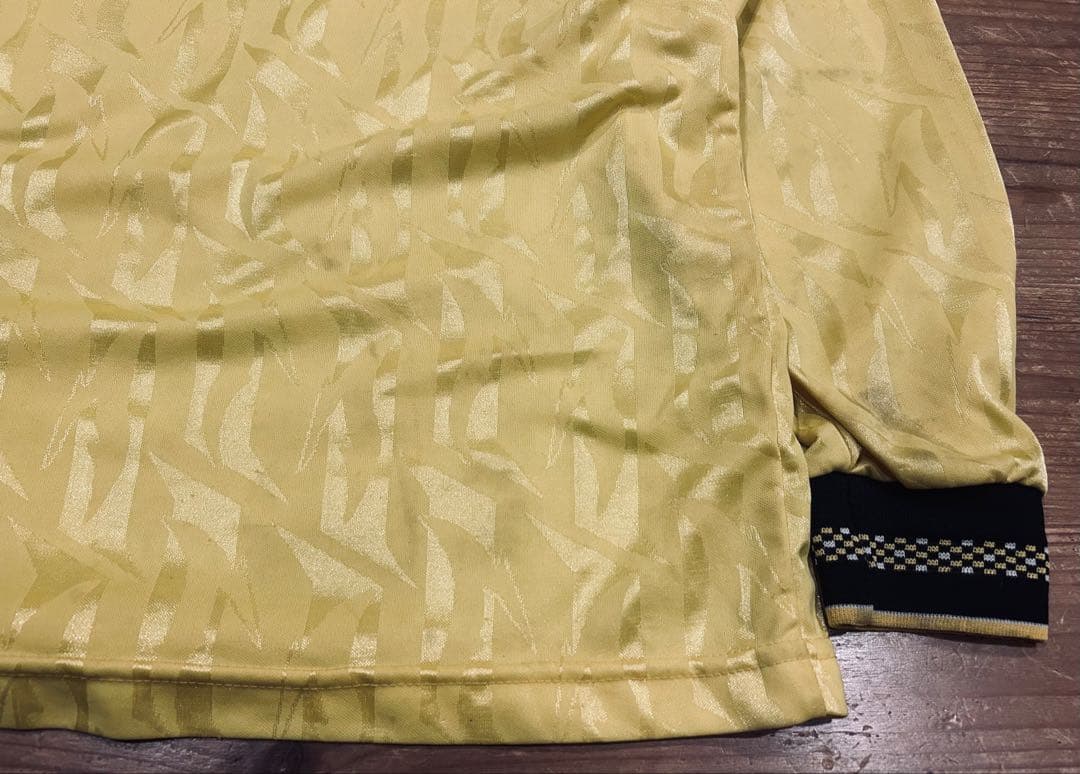 ユニフォーム 古着 90s Bukta バクタ UK製 黄色 Vネック 40