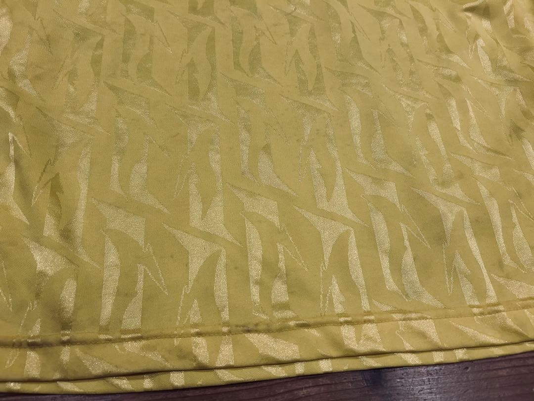 ユニフォーム 古着 90s Bukta バクタ UK製 黄色 Vネック 40