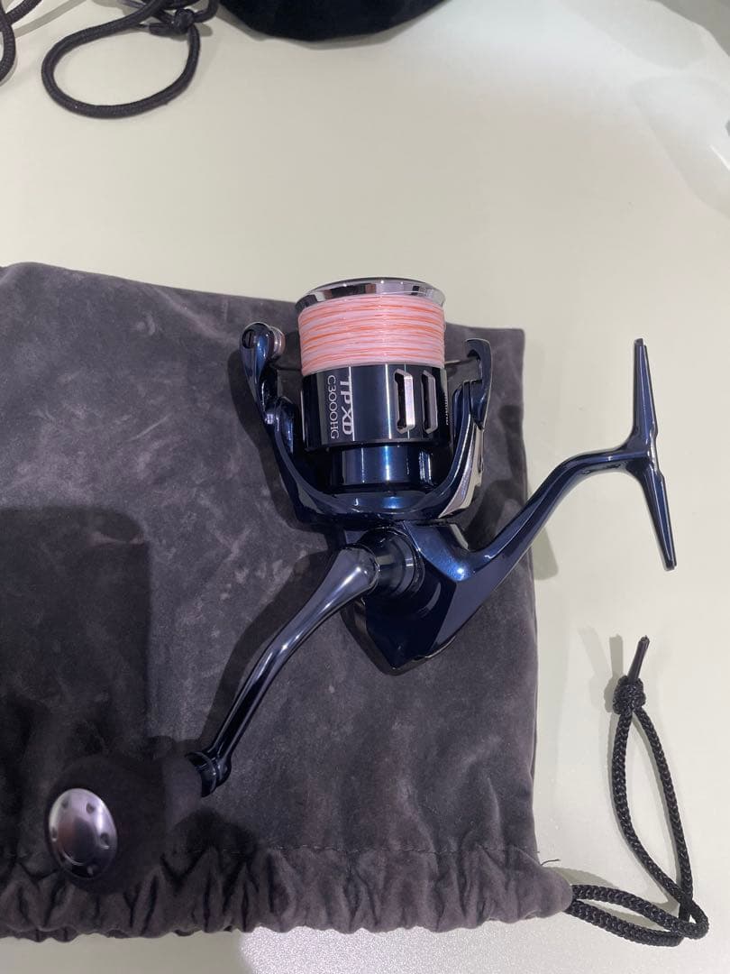 21ツインパワーXD C3000HG 収納袋付き