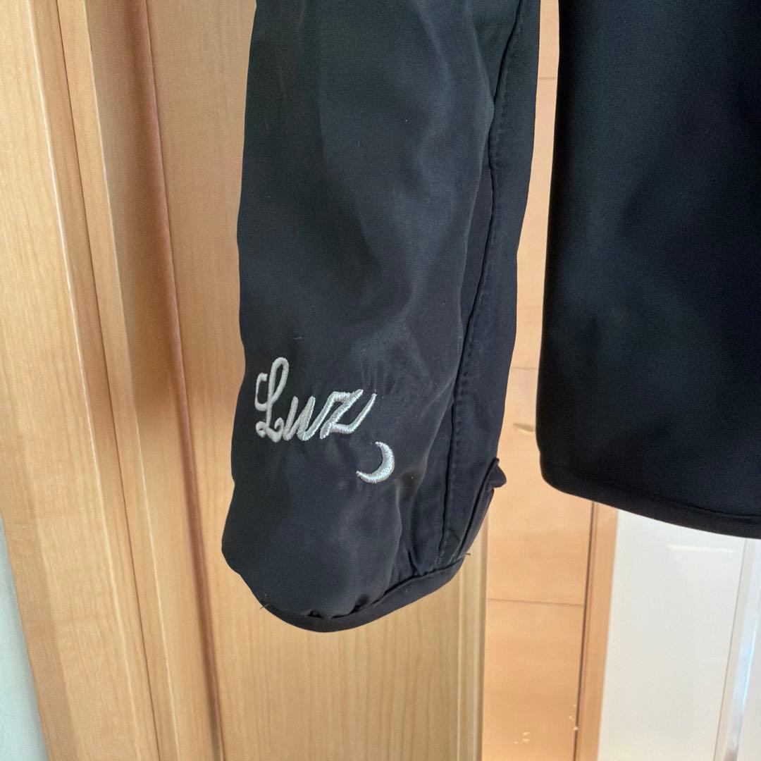 LS ブラックノーカラージャケット Luz Top Team