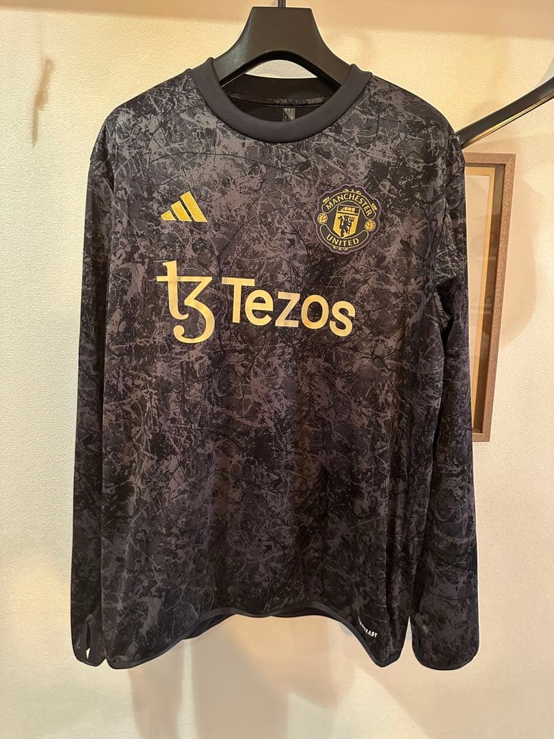 【新品】マンチェスターユナイテッド ストーンローゼズ　プレマッチトップ　長袖