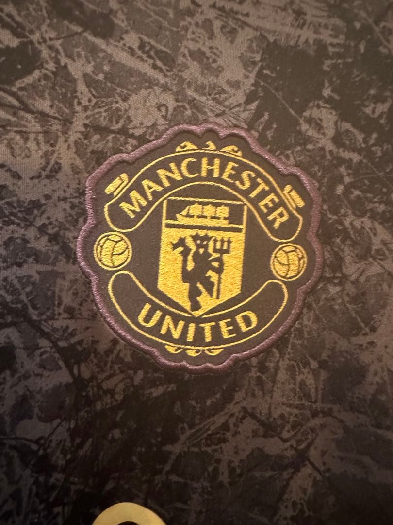 【新品】マンチェスターユナイテッド ストーンローゼズ　プレマッチトップ　長袖