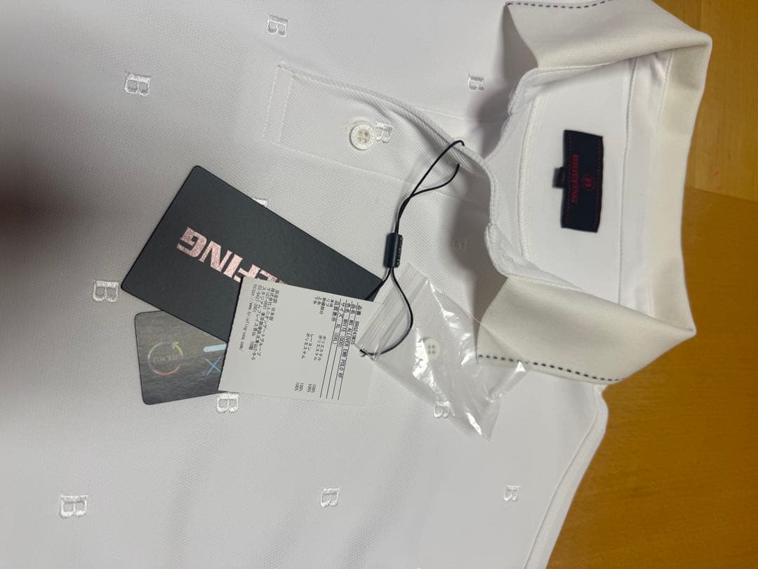 ブリーフィング　ホワイト B刺繍 ポロシャツ 新品(未使用) タグ付きサイズＸL