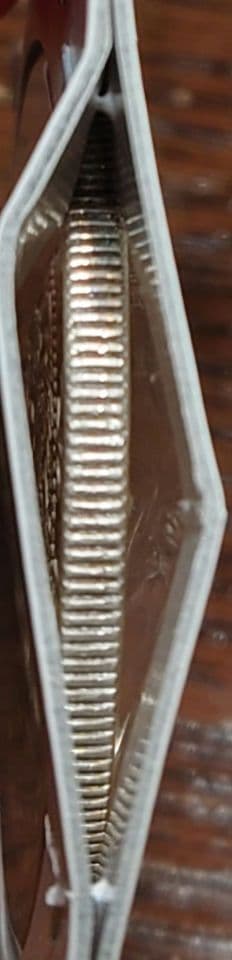 ①　一圓銀貨　明治11年深彫り　左丸銀打ち