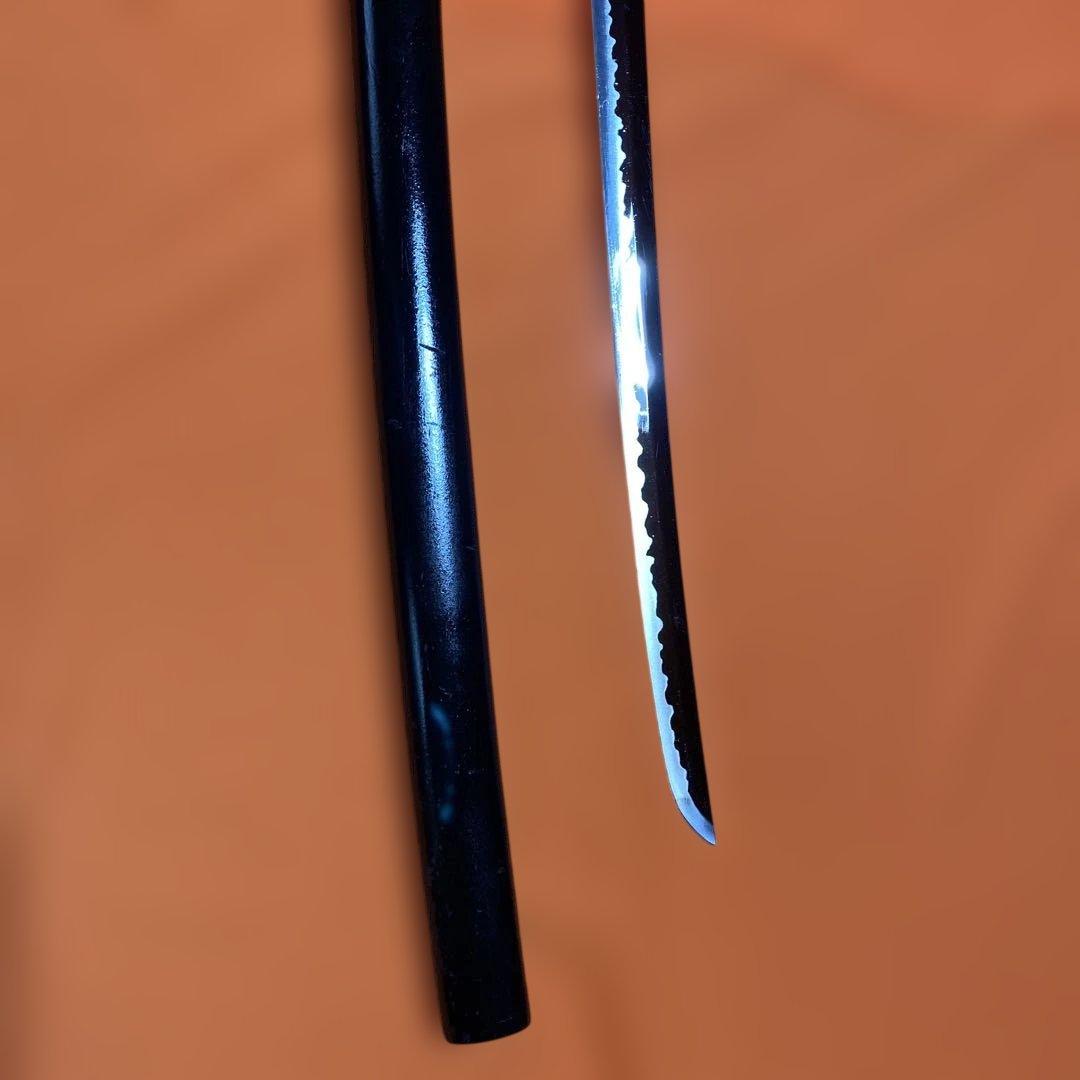 割安模造刀 黒柄 雲龍楕円鍔 黒呂鞘