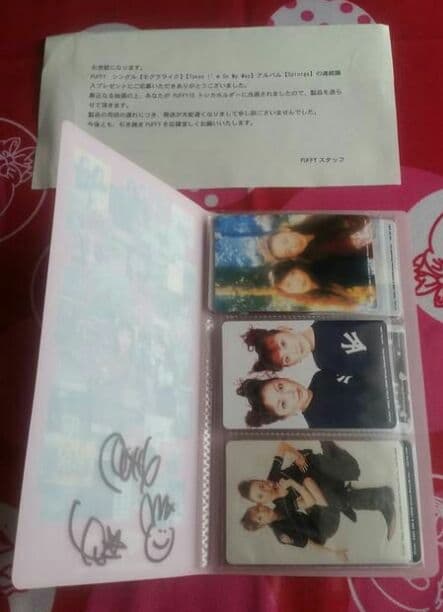 PUFFYの直筆サイン入りトレカホルダー