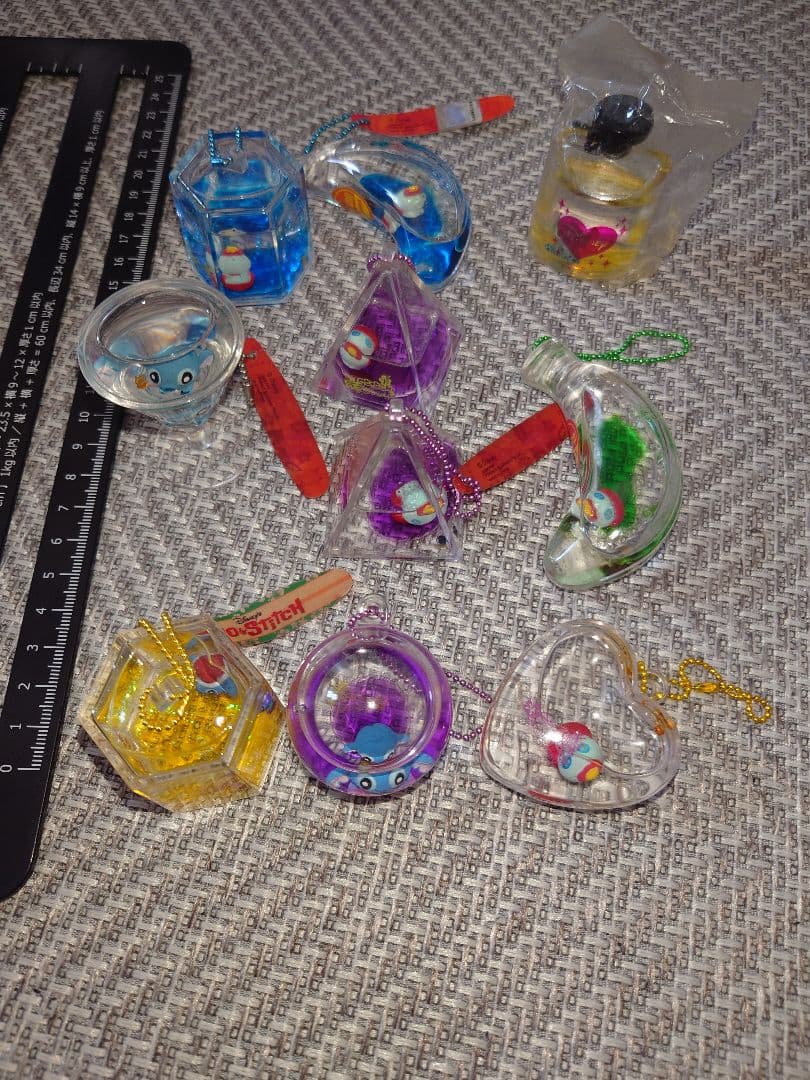 24時間限定値下げ リロ・アンド・スティッチ オイルチャーム ？ 10個セット