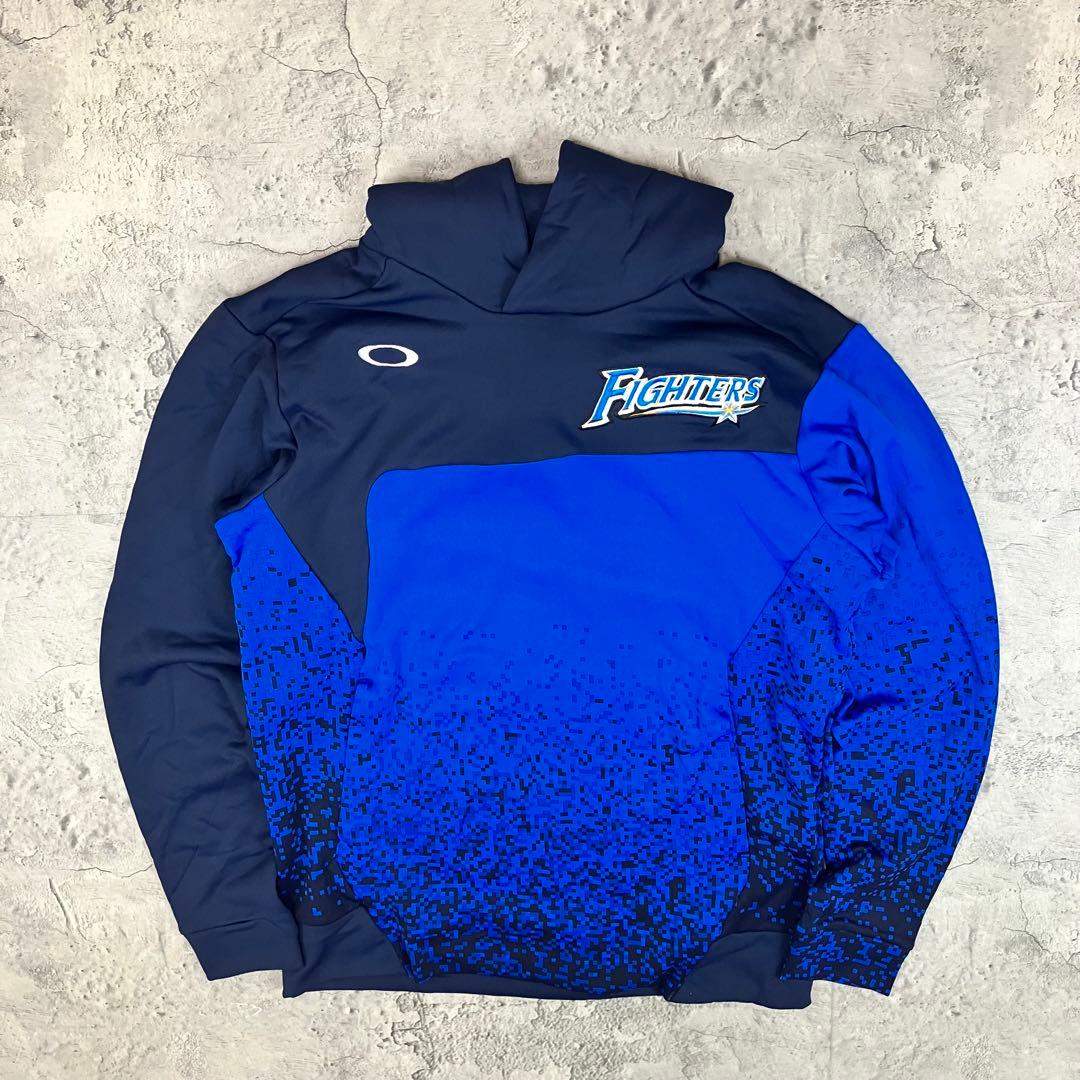 北海道日本ハムファイターズ フリースパーカー オークリー 古着 刺繍 紺青 XL