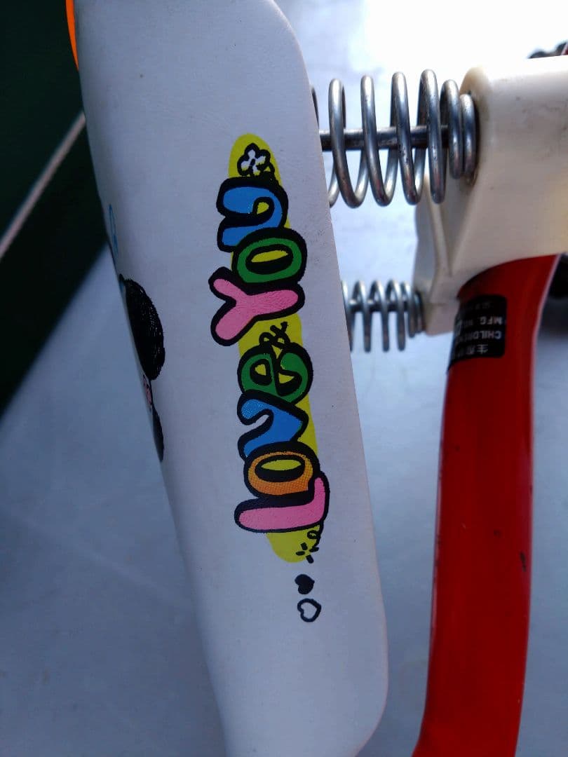 昭和赤いキャラクター付き三輪車