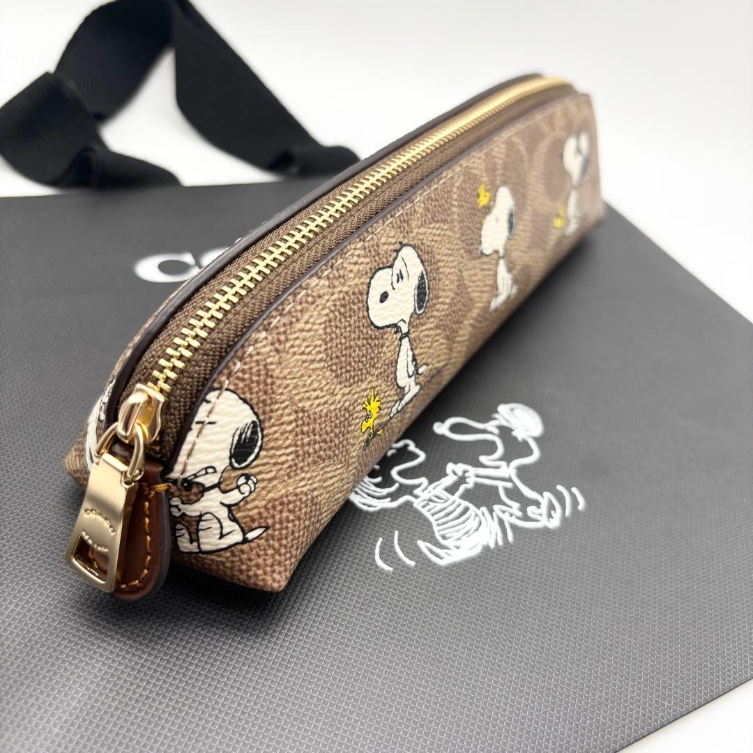 【COACH X PEANUTS】ペンシル ケース！スヌーピー 紙袋付き！