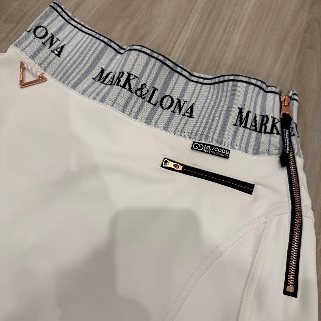 マークアンドロナ　2023年モデル　コードシリーズ　ゴルフ　スカート　ロゴ　金具