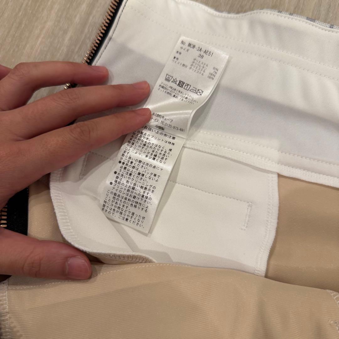 マークアンドロナ　2023年モデル　コードシリーズ　ゴルフ　スカート　ロゴ　金具