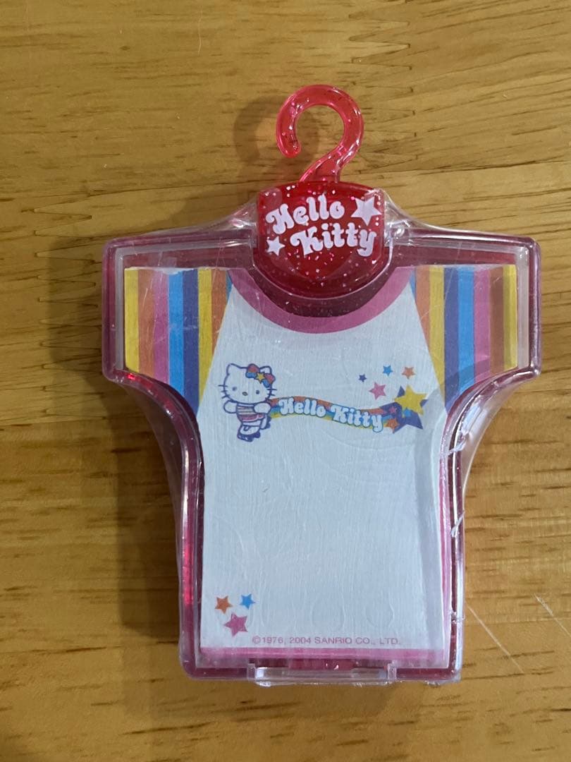海外サンリオ　ハローキティ ケース入りダイカットメモ　ローラー　80シート