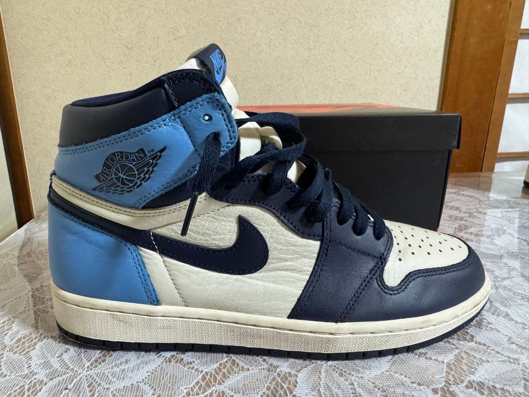 ナイキ エアジョーダン1 レトロ ハイOGオブシディアン ユニバーシティ ブルー