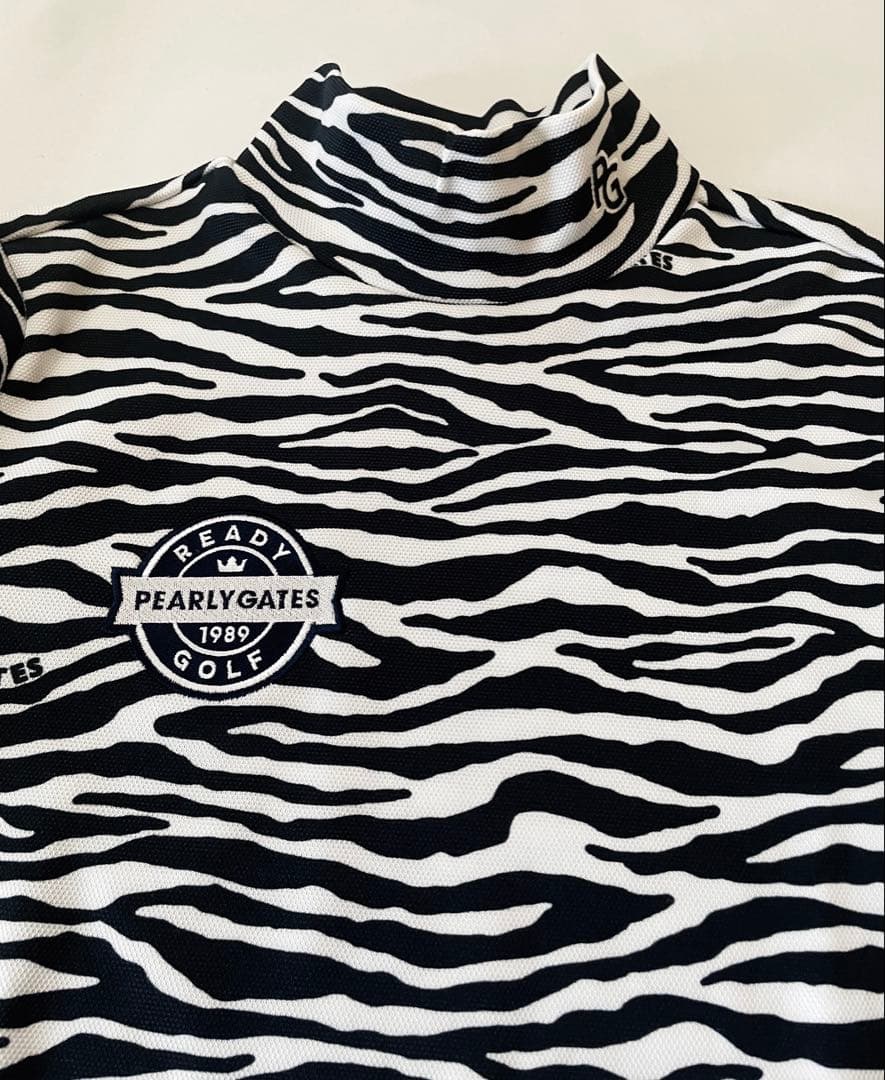 【新品・未使用品】PEARLY GATES ゼブラ柄 ハイネック長袖 レディース