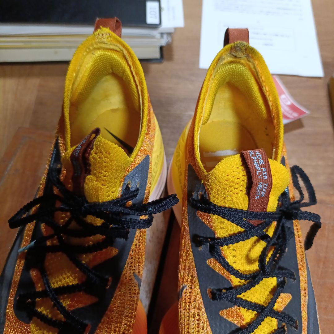 ナイキNIKE アルファフライネクスト% 27.5cmオレンジ×黒