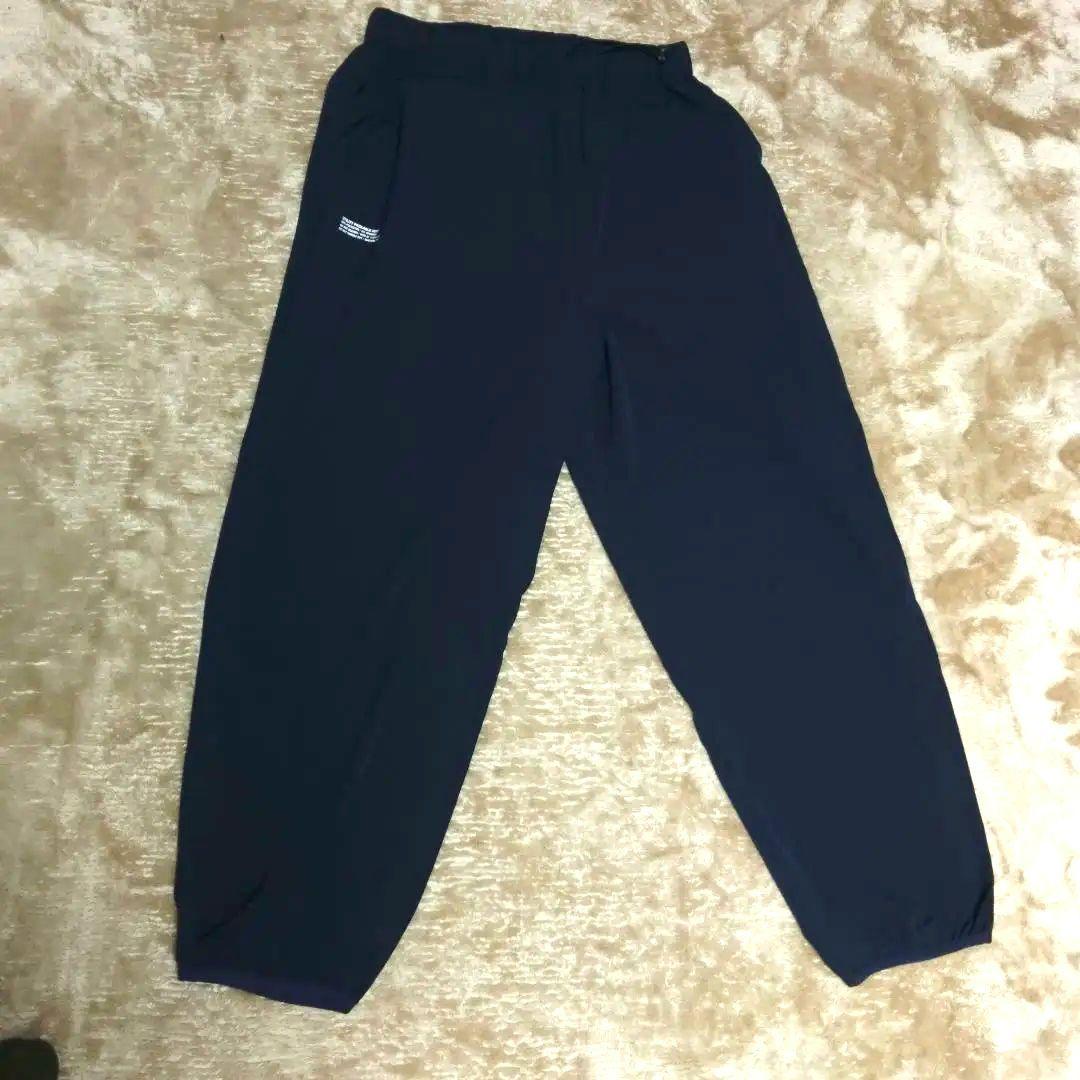 UTILITY PACKABLE SUIT NAVY Mサイズ