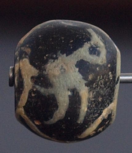 ジャワ発掘、珍しい横向き鳥マニック・ブルン　黒の胎に白で鳥・放射・Ｘ・環モチーフ