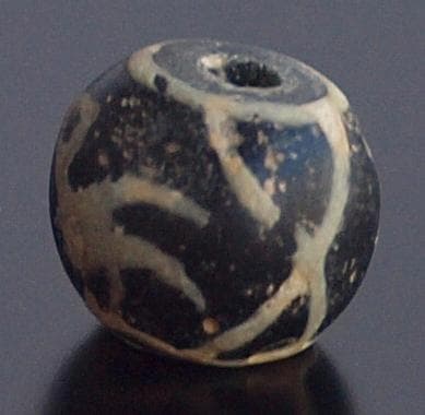 ジャワ発掘、珍しい横向き鳥マニック・ブルン　黒の胎に白で鳥・放射・Ｘ・環モチーフ