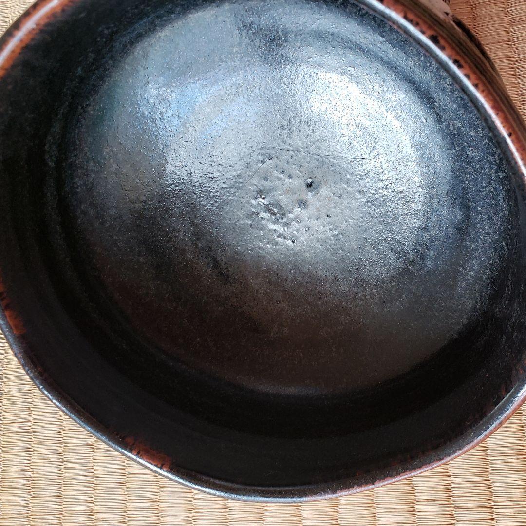 No140　大振りで古い黒織部茶碗