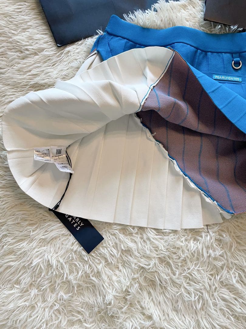 パーリーゲイツレディース 光栓 Wジャガード＋ピンタック ニットスカートサイズ0