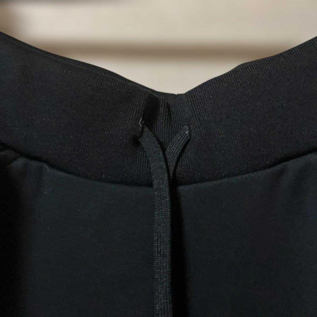 ELLESSE ジャージセットアップ ブラック パンツバックロゴ刺繍レディースＭ