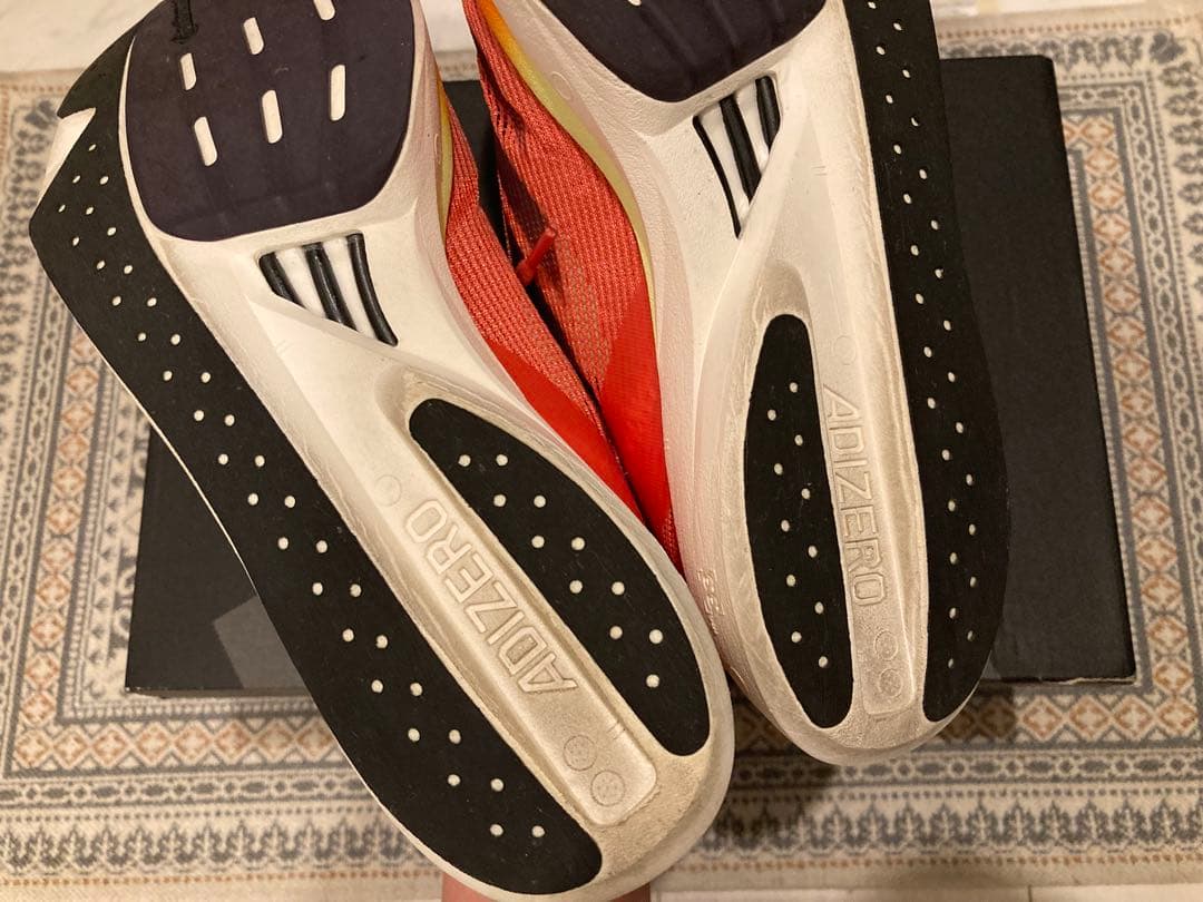 ADIZERO TAKUMI SEN 10 レッド スパイクシューズ