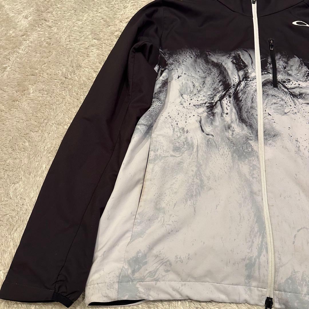 特大　オークリー　ジャケット　ナイロン　総柄　メンズ　サイズXL スカル　ロゴ