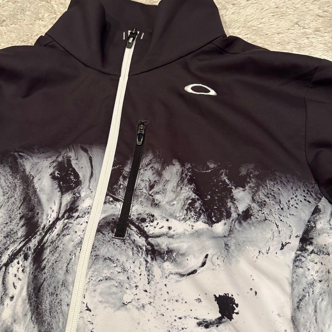 特大　オークリー　ジャケット　ナイロン　総柄　メンズ　サイズXL スカル　ロゴ