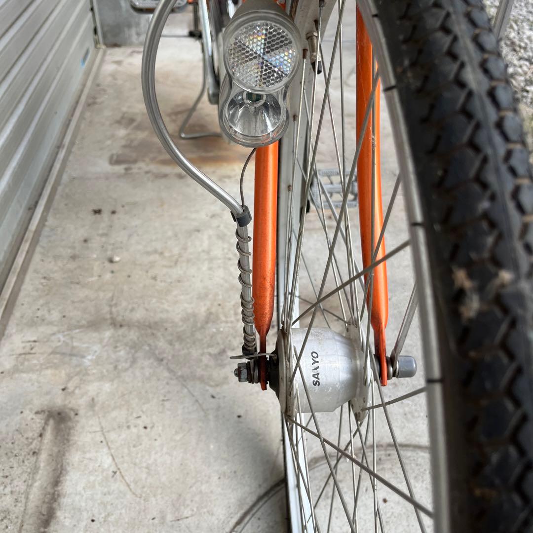 26インチオレンジ シティサイクル 前バスケット付き