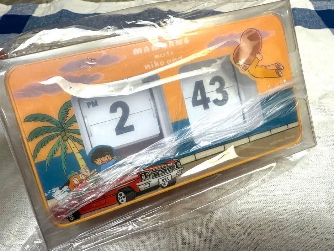 値下げ！新品 nikoand ニコアンド マムアンちゃん パタパタ時計 くるり