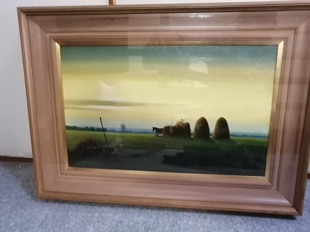 松本竹敏「夕暮れに草を積む農夫」