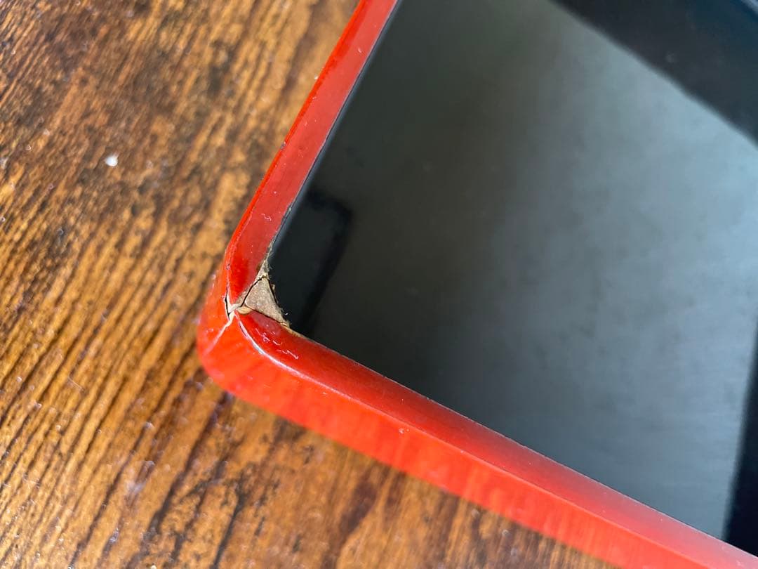 扇形装飾の赤い重箱