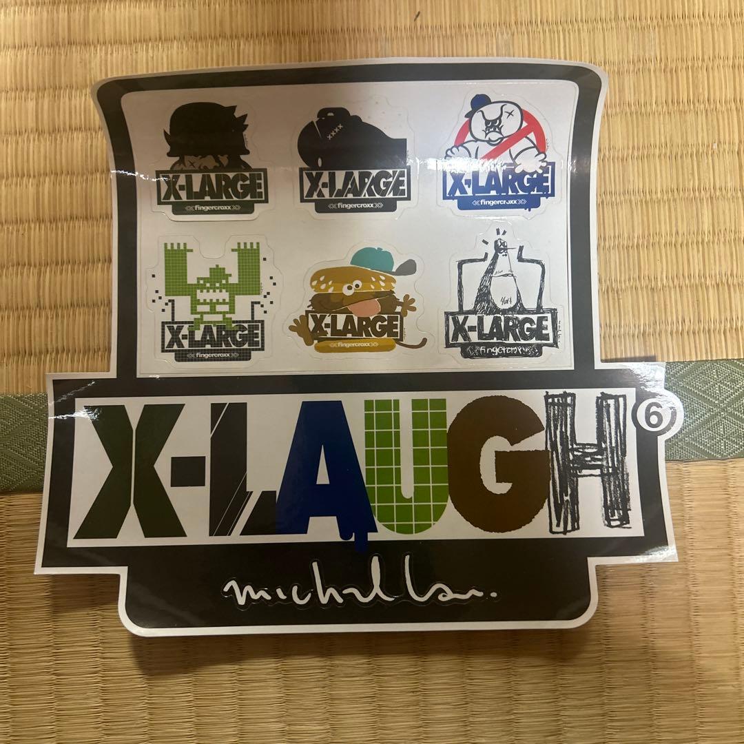 X-LARGE マイケルラウ　フィギュアとステッカー