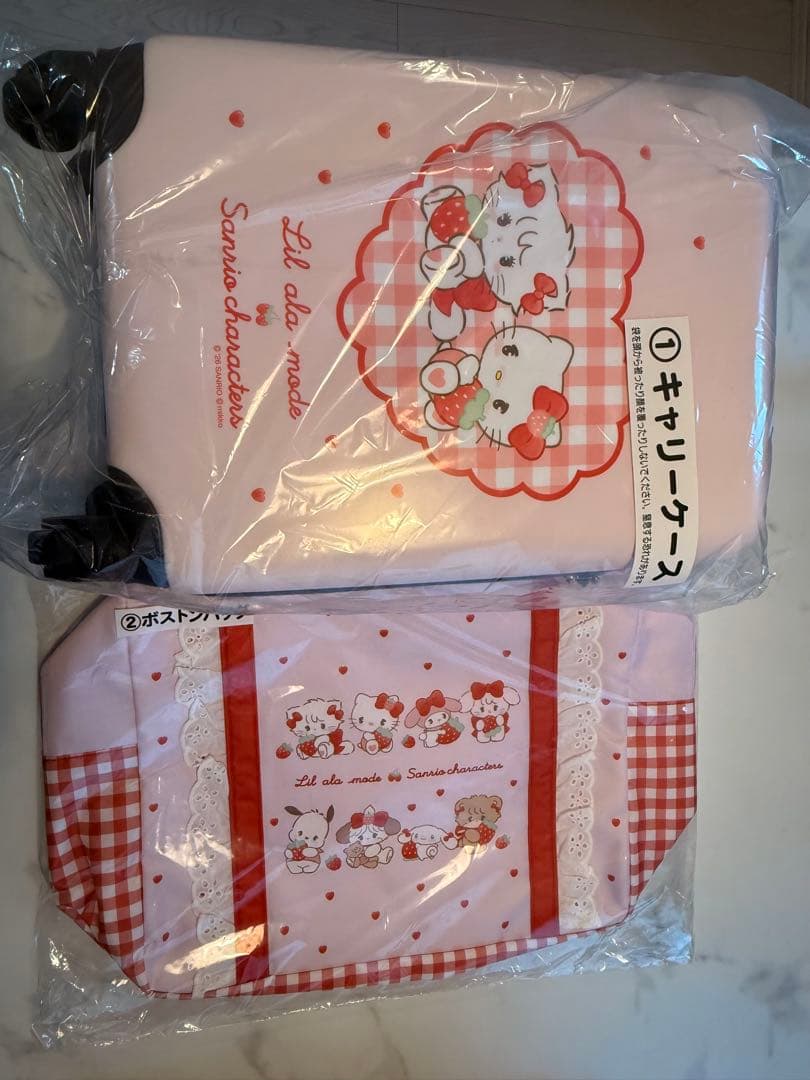 サンリオキャラクターズ Lil ala mode キャリーケース ボストンバッグ