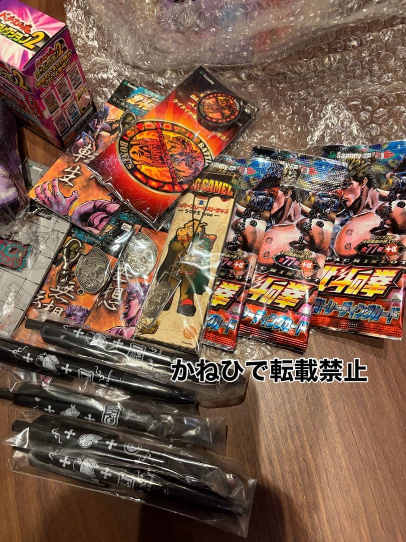 おまけ付き 初代パチスロ 北斗の拳 リール缶 ドデカセット 景品多数入り