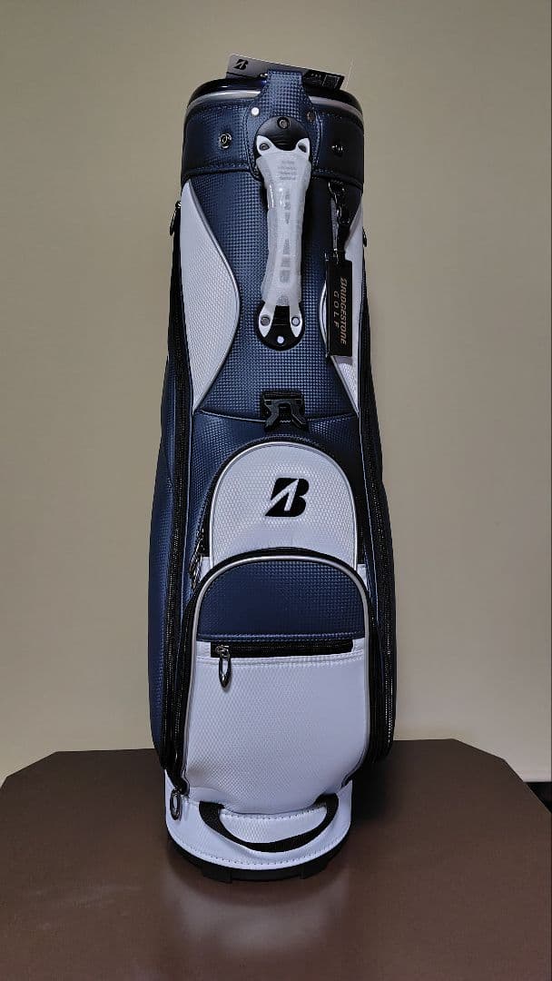キル新品未使用ブリヂストン キャディバッグ ネイビー/ホワイト　9型