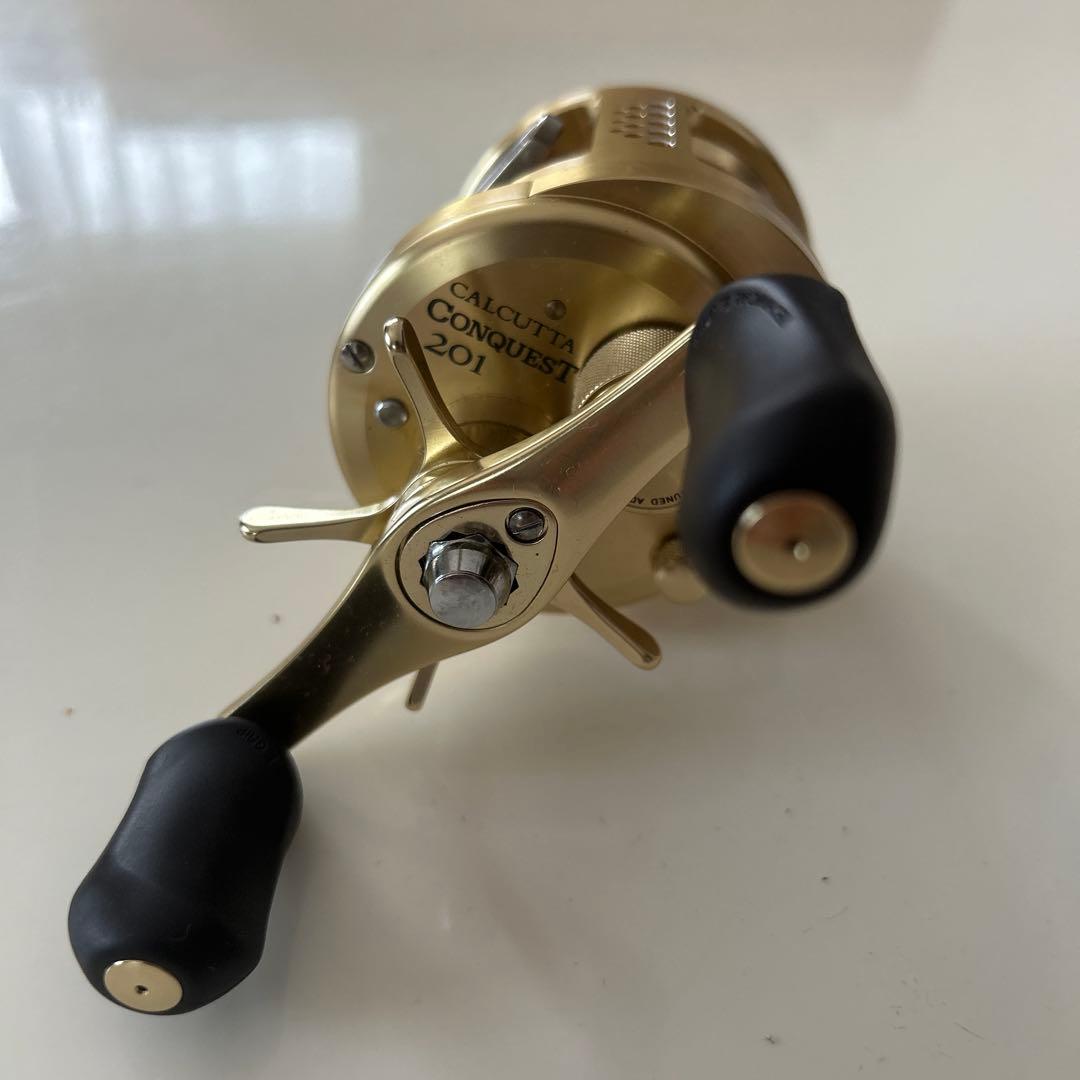 CALCUTTA CONQUEST 201 ゴールド ベイトリール