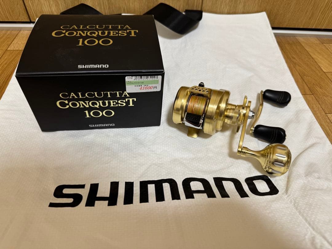 美品　シマノ14カルカッタコンクエストローギア 100 社外ハンドル（純正有り）